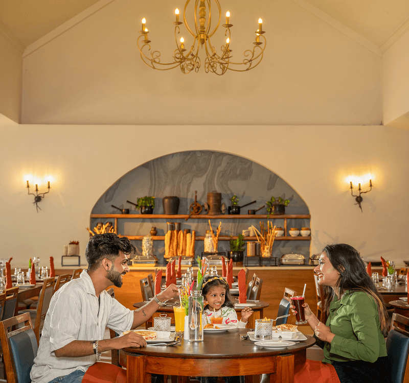 Riverbabble Restaurant at Blanket Riverside Resort, Munnar — outdoor dining deck