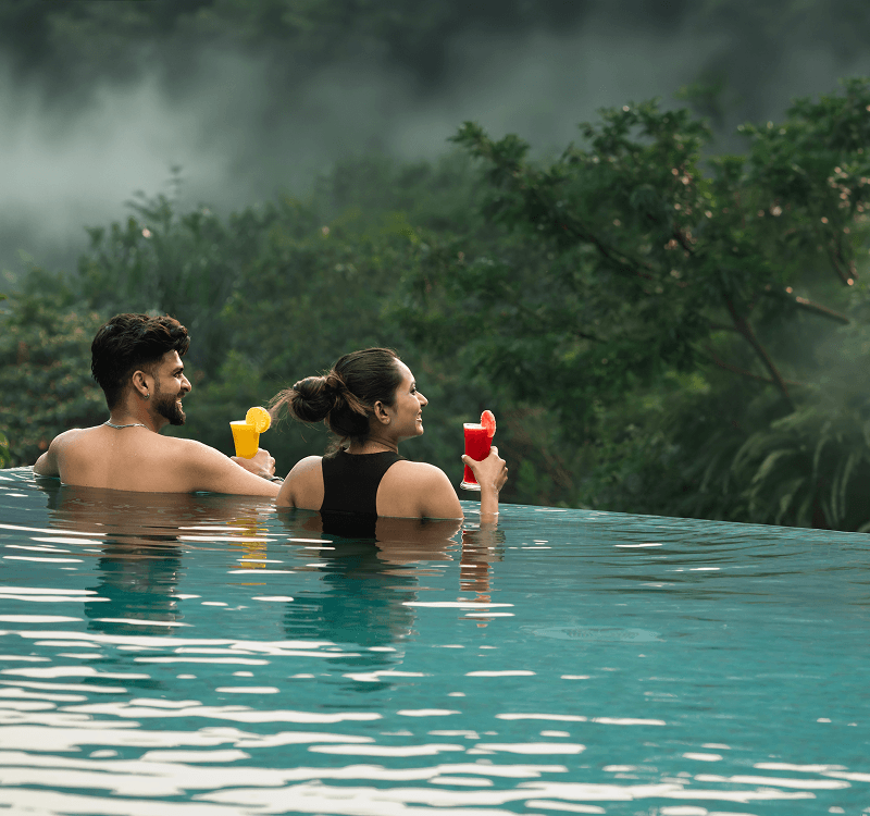 Infinity pool overlooking the river at Blanket Riverside Resort, Munnar
